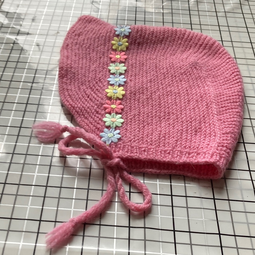 Charming Pink Knit Baby Hat with Floral Details